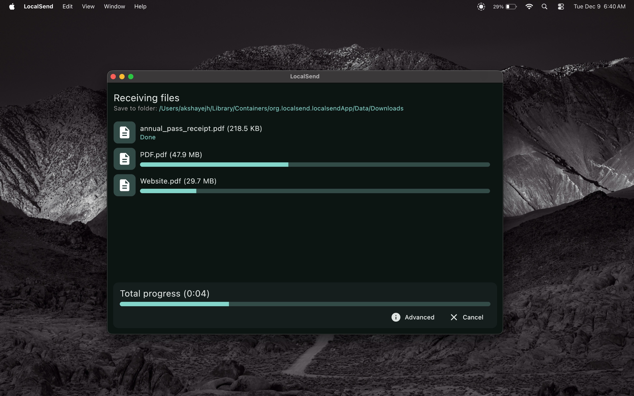 LocalSend’s macOS receiving screen showing completed and active file transfers, individual progress bars, and total progress.