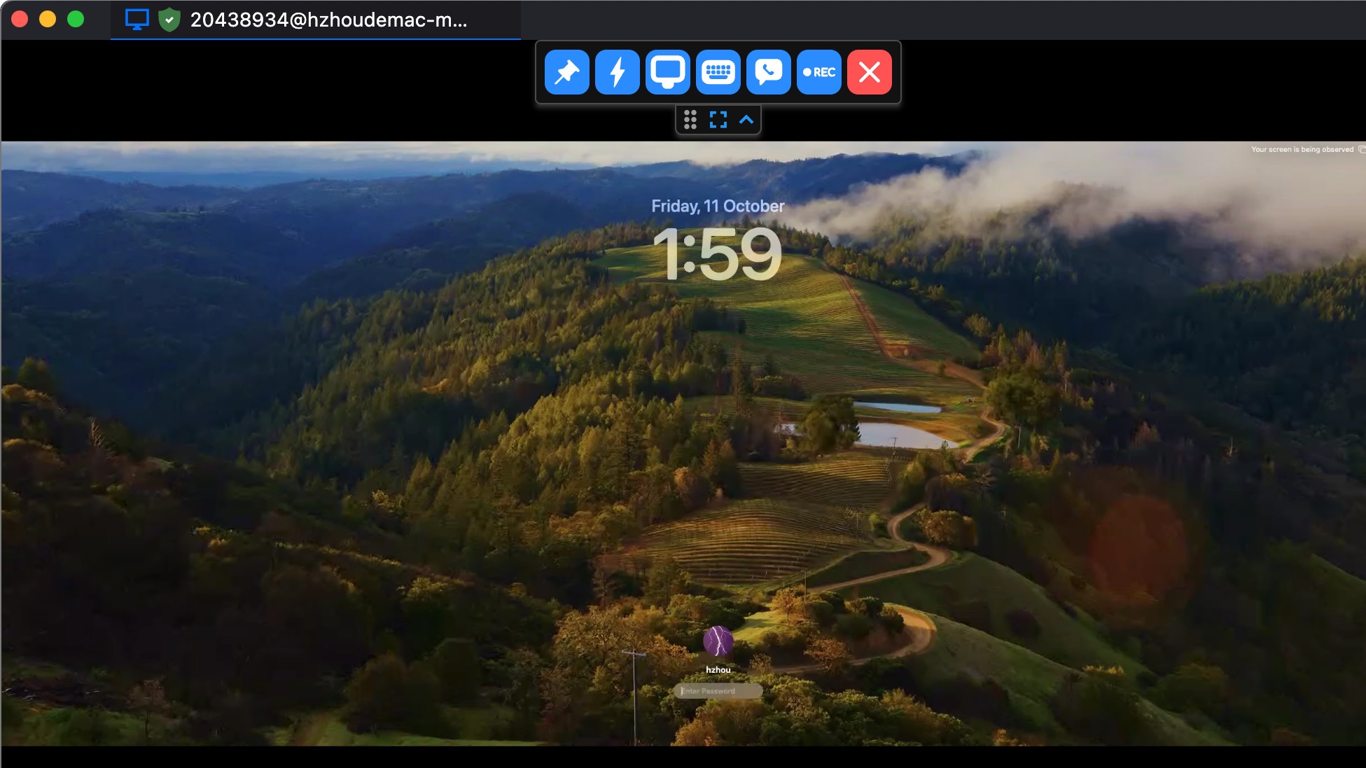 A RustDesk remote desktop session showing a macOS login screen and the floating session-control toolbar.